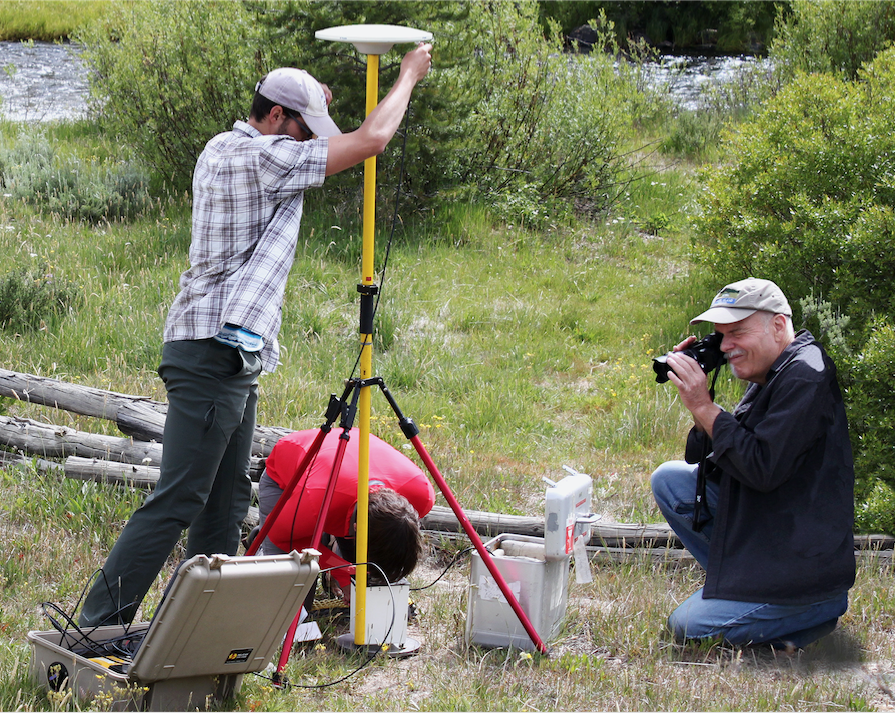 PI Rick Tessman shoots video of students Joey Lane and Erica Larsen taking gravimeter readings along a transect in Idaho as part of the IDOR project.