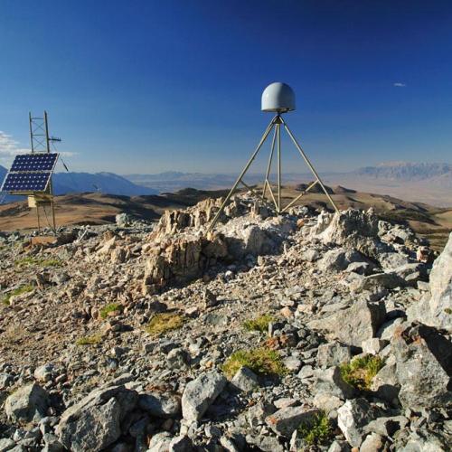 Numerous Plate Boundary Observatory (PBO) stations (right) and seismic monitoring stations (left, with solar panels) have been placed throughout North America by UNAVCO, the Incorporated Research Institute for Seismology (IRIS), and EarthScope.