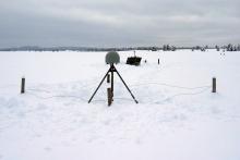 PBO monument P360 uses GPS technology to monitor snow depth in Island Park, Montana. This station, powered by a solar panel, is one of 100 used by researchers to measure snow depth using GPS. Credit: UNAVCO